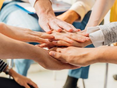 Panoramic teamwork business join hand together concept, Business team standing hands together, Volunteer charity work. People joining for cooperation success business. Customer Success is the final step of the Customer Experience journey